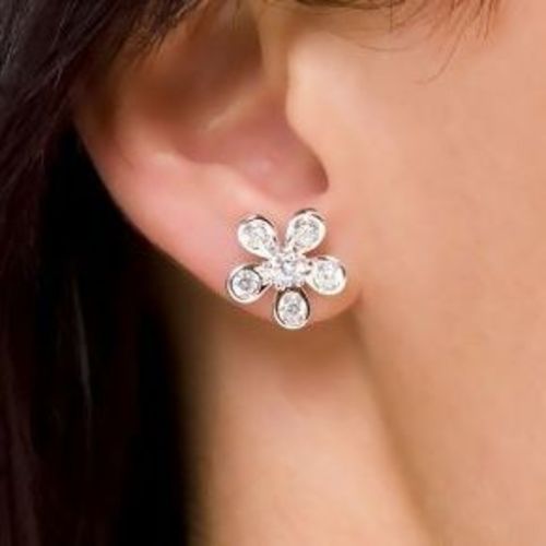 silver earrings design of flower with stones